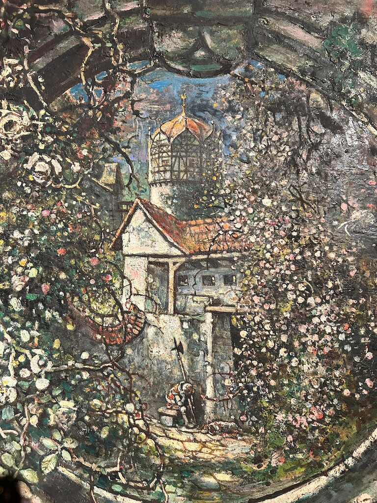 Ein Bild von einer Burg mit einem Ritter davor.