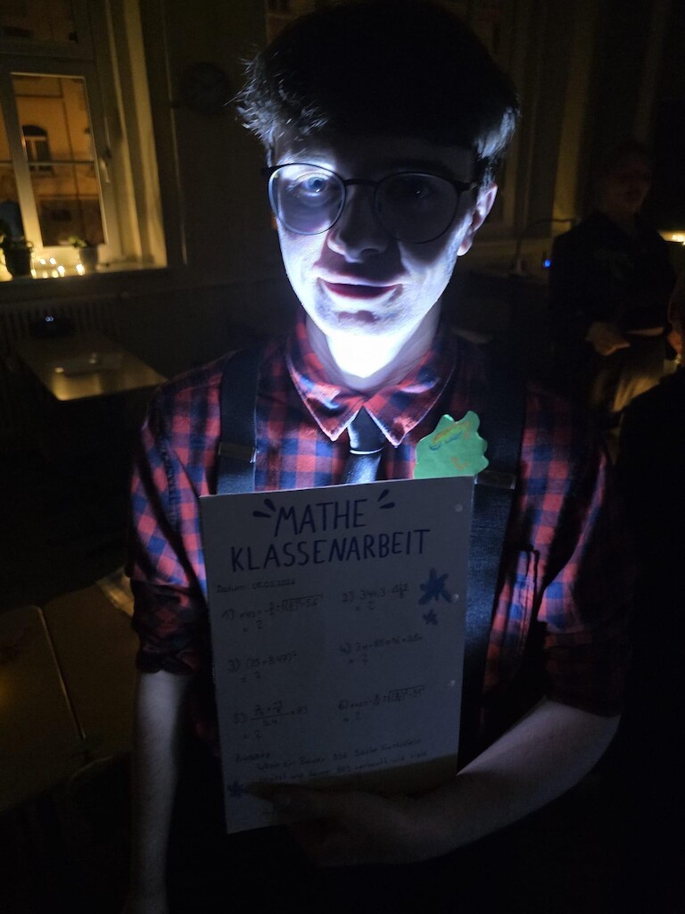 Das Gesicht beleuchtet.